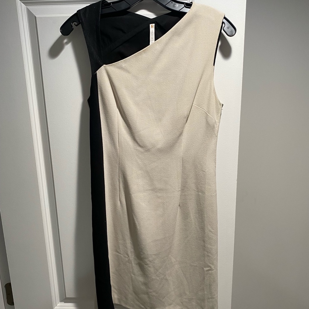 Worn once — marks on leather happened while hanging in closet